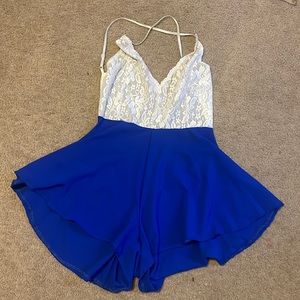 Dark blue romper, never worn. Bought offline and was just to big.